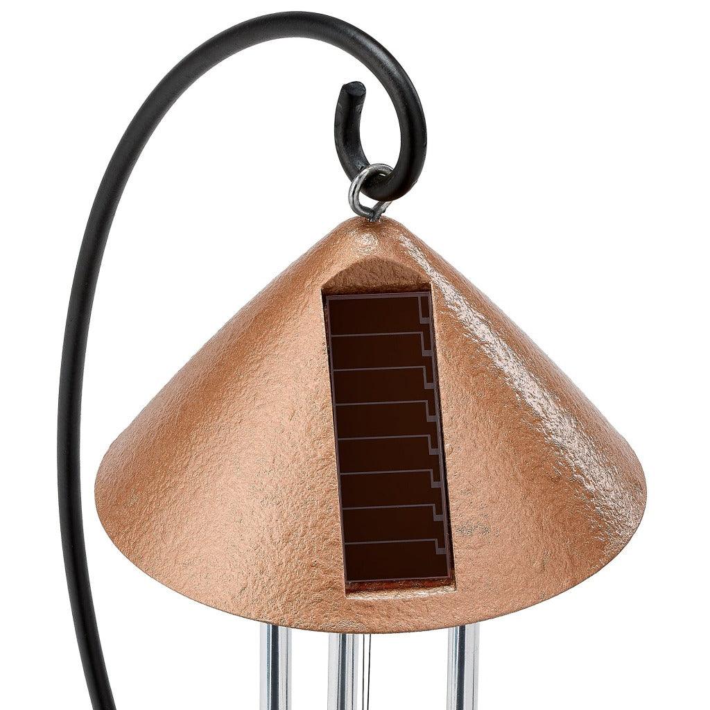 Reverse side of solar chime top showing the solar cell embedded in top