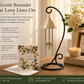 Memorial chime with descriptive text on a table with flowers and books.
